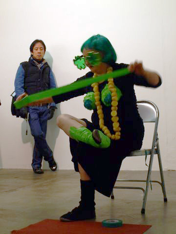 Tanya Mars: <em>What did the 0 say to the 8</em>, wrapping her feet, 2010, performance shot, <em>CHAOS</em>; photo Jordan Hutchings; courtesy CHAOS